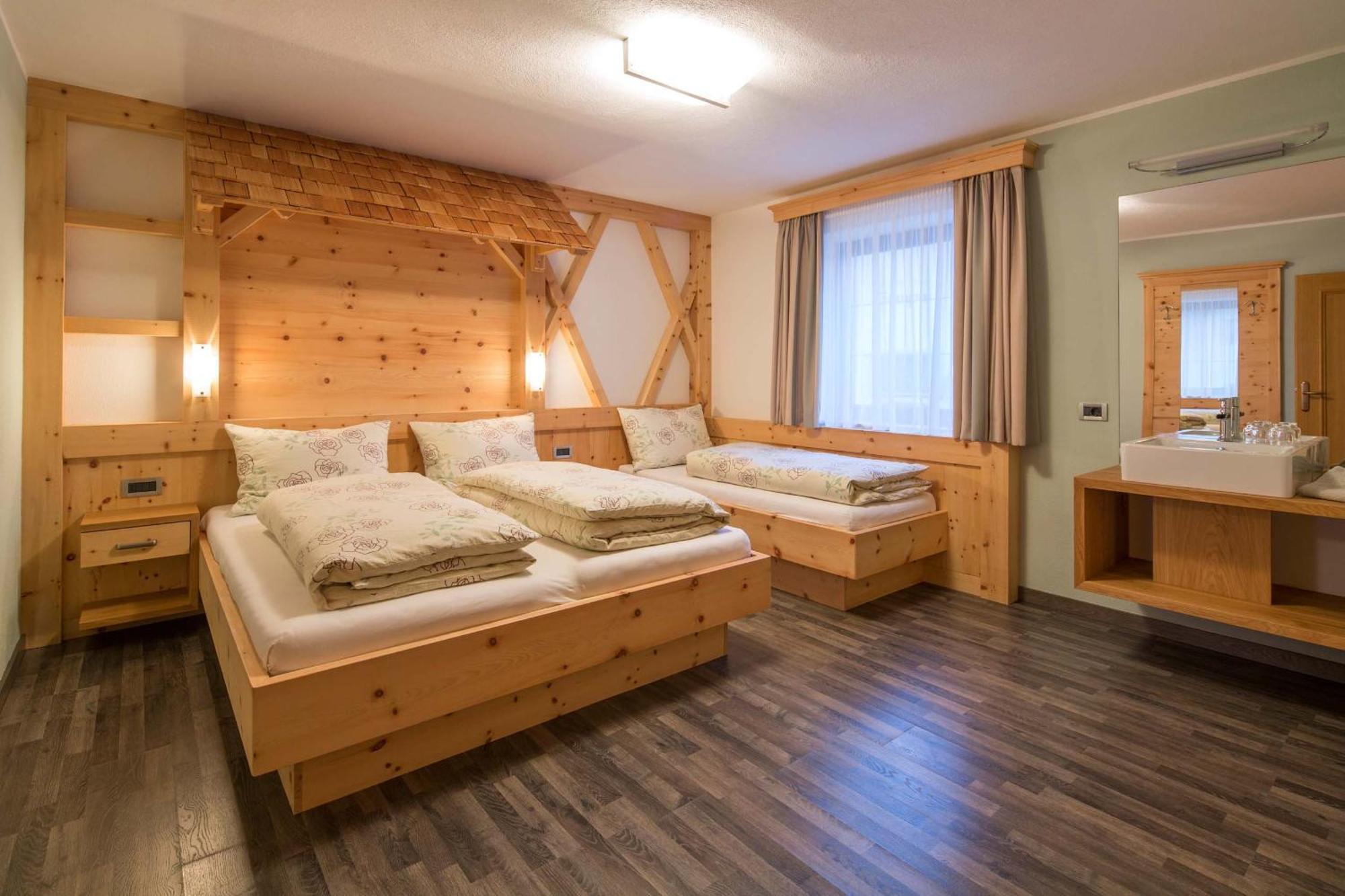 Alpin Apartments Colfosco Habitación foto